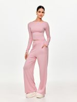 Front view of the BEYOURA Ardena Wide-Legged Hush Pants in dusty pink with relaxed silhouette