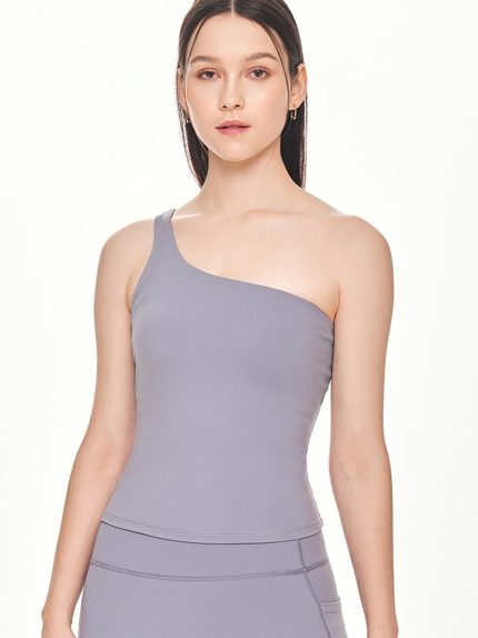 Close-up front view of the BEYOURA Charlotte Asymmetrical luxeFIT Top in grey blue