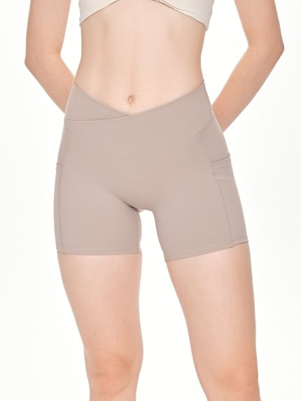 Close-up front view of the BEYOURA Elliana V-Line luxeFIT Shorts in beige