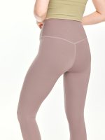 Medium close-up back view of the BEYOURA Estelle Bare Touch luxeFIT Leggings in light brown