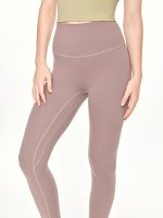 Medium close-up front view of the BEYOURA Estelle Bare Touch luxeFIT Leggings in light brown