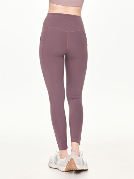 Close-up back view of the BEYOURA Estelle Cool Core luxeFIT Leggings in purple