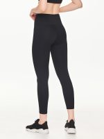 Close-up back view of the BEYOURA Estelle Stretch & Stash luxeFIT Leggings in black