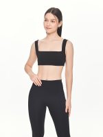 Medium close-up front view of the BEYOURA Estelle Stretch & Stash luxeFIT Leggings in black