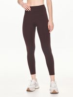 Close-up front view of the BEYOURA Estelle Stretch & Stash luxeFIT Leggings in brown