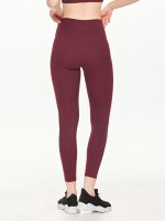 Close-up back view of the BEYOURA Estelle Stretch & Stash luxeFIT Leggings in maroon
