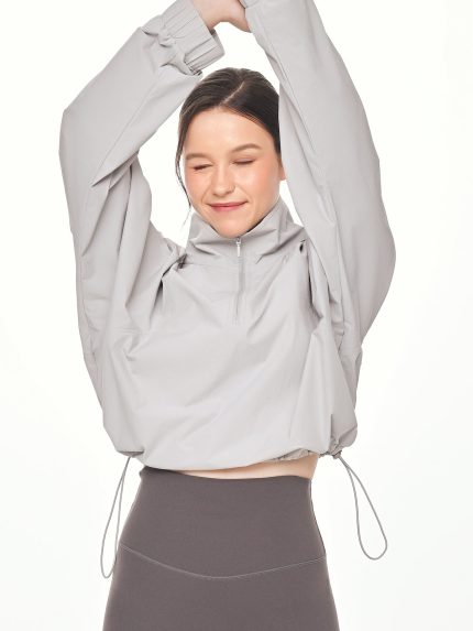 Close-up front view of the BEYOURA Madeleine Cropped luxeFIT Lightweight Pullover in light grey