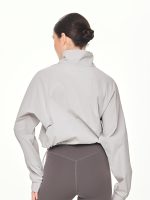 Close-up back view of the BEYOURA Madeleine Cropped luxeFIT Lightweight Pullover in light grey