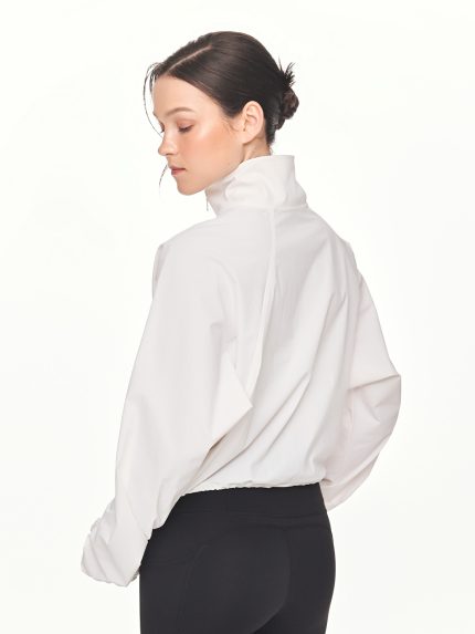 Close-up back view of the BEYOURA Madeleine Cropped luxeFIT Lightweight Pullover in off-white