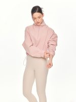 Medium long-shot front view of the BEYOURA Madeleine Cropped luxeFIT Lightweight Pullover in pink