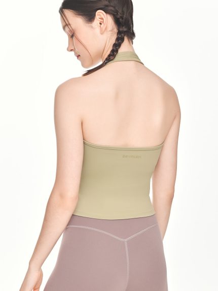 Close-up back view of the BEYOURA Charlotte Halter luxeFIT Top in sage green