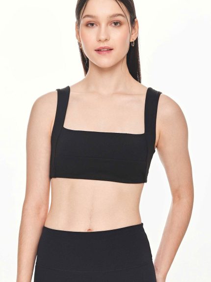 Close-up front view of the BEYOURA Giselle Broad Strap luxeFIT Sports Bra in black