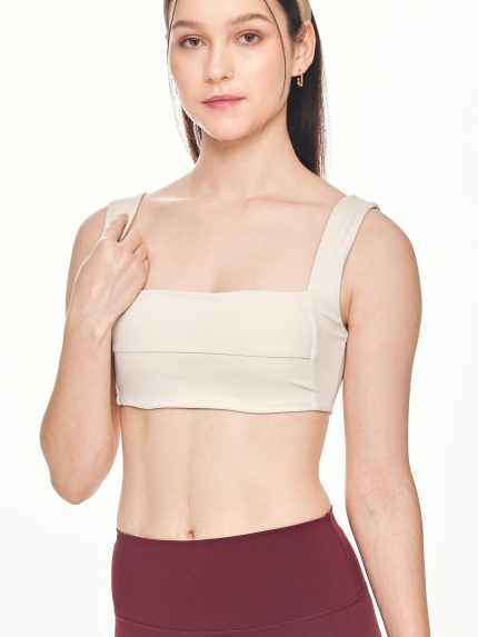 Close-up front view of the BEYOURA Giselle Broad Strap luxeFIT Sports Bra in off-white