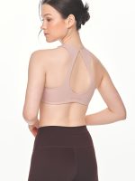 Close-up back view of the BEYOURA Giselle Twist luxeFIT Sports Bra in pink