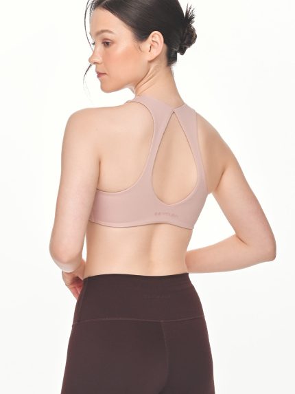 Close-up back view of the BEYOURA Giselle Twist luxeFIT Sports Bra in pink