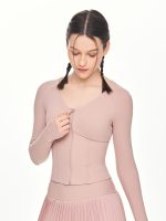 Close-up front view of model posing with the zipper of the BEYOURA Madeleine Body Hugging luxeFIT Jacket in pink