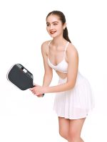 Full side view of BEYOURA Celestine crossback LuxeFIT dress in white styled with pickleball racket
